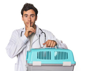 Young Hispanic man as vet with cage keeping a secret or asking for silence.