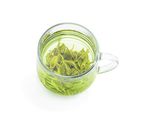 Longjing tea in glass cup isolated on white background