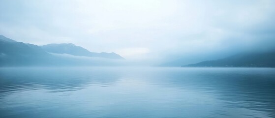 Foggy Mountain Landscape with Calm Water