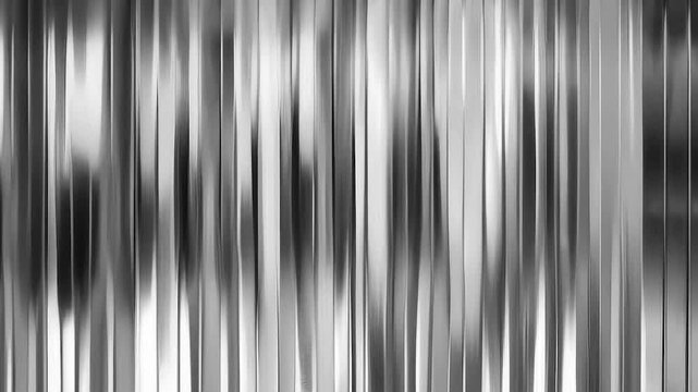 Vibrant vertical pattern of metallic stripes in shifting hues of silver colors. The motion create a dynamic effect with the colors smoothly transitioning evoking a sense of modern, fluid energy