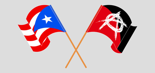 Crossed and waving flags of Puerto Rico and Anarchy