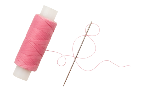 Old spool of thread and needle on a white background. Sewing accessories