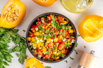 Autumn pumpkin and vegetable salsa. Mexican pumpkin, fresh vegetable and corn salad. Healthy...