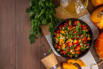 Autumn pumpkin and vegetable salsa. Mexican pumpkin, fresh vegetable and corn salad. Healthy vegetarian food, copy space