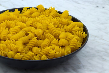 Raw fusilli pasta from southern Italy