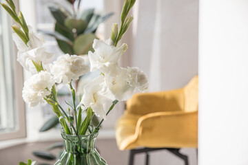 Beautiful bouquet of white carnations and gladiol
