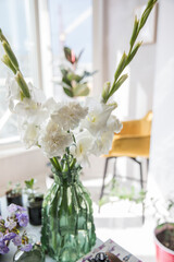 Beautiful bouquet of white carnations and gladiol