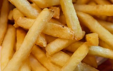 Macro fried potatoes. Potato fry. Food. Texture. Background. Wallpaper.
