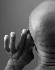 deaf man suffering from deafness and hearing loss on grey background with people stock image stock...
