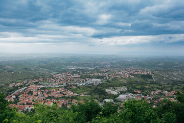 Breathtaking panorama overlooking San Marino under a cloudy sky