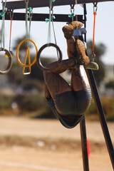 muddy athlete passing a ring test