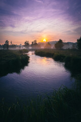 Naklejka premium Sonnenaufgang am Fluss