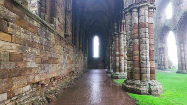 Foggy winters scene of the famous landmark Whitby Abby now derelict and formally a Benedictine abbey and is situated overlooking the sea on the East coast of England
