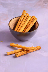 Cinnamon Sticks Inside and Around the Bowl