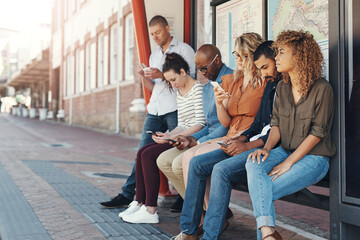 Stations, cellphone and waiting for bus, people and row for travel in morning, serious and New York. City, group and queue to commute in line, together and texting for late public transport of USA