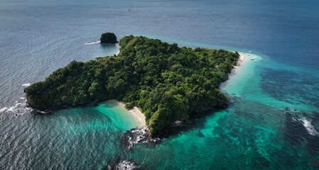 Aerial view of Nosy Tanikely Island showcasing lush greenery and clear waters in Madagascar