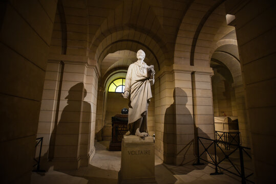 Voltaire Statue and Shadows beneath the Arches of the Panth&eacute;on - Paris, France
