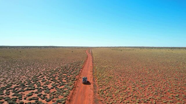 Remote track across the red Australian outback