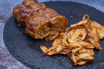 Mock meat- plant based alternative - seitan. Washed flour gluten with spices,  steamed and roasted.