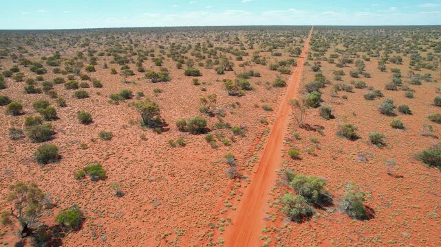 Remote track across the red Australian outback