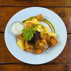 Fried cauliflower with potatoes in Czech republic, Europe
