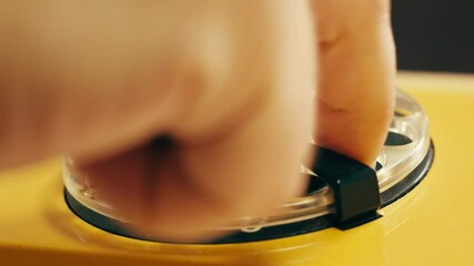 Retro vintage phone, A yellow rotary telephone is displayed on a wooden desk, adding a nostalgic touch