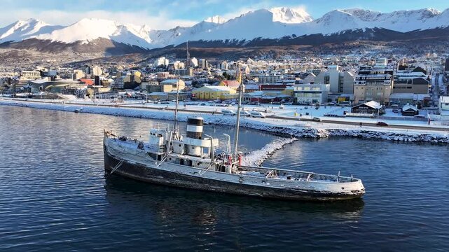 Saint Christopher Boat At Ushuaia In Tierra Del Fuego Argentina. Saint Christopher Boat. Ship Sculpture. Downtown Cityscape. Saint Christopher Boat At Ushuaia In Tierra Del Fuego Argentina.