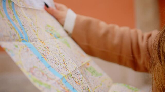 Young Girl Checking A Map While Travelling In Europe