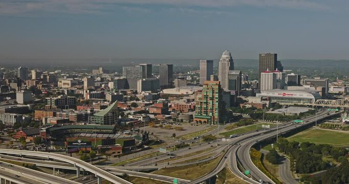 Louisville Kentucky Aerial v51 flyover complex interstate freeways capturing commuting traffics, baseball field, downtown cityscape and bridges of the river - Shot with Inspire 3 8k - Sept 26th 2023