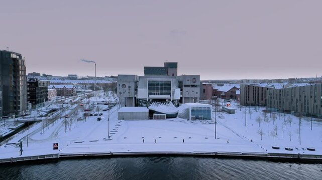 Winter aerial cityscape of Aalborg, North Jutland Region (Nordjylland), Denmark. Famous landmark - House of Music (Musikkens Hus) is in the center