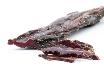 Delicacy dry smoked beef meat isolated on white