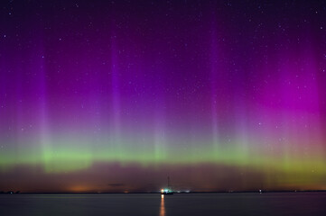 Aurora Borealis Over the Water in Heiligenhafen, Germany