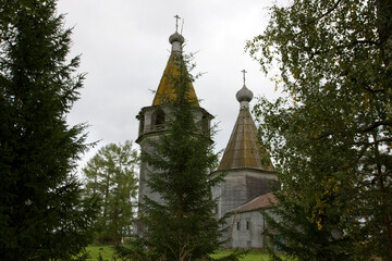 Arkhangelsk region Lyadinsky churchyard on a cloudy summer day