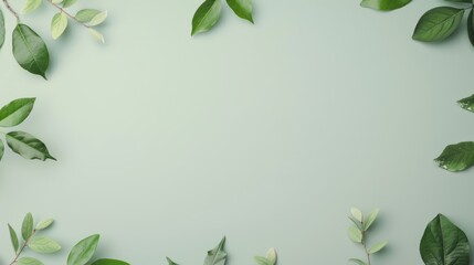 Fototapeta premium A simple yet elegant composition with a green foliage border surrounding a blank space, perfect for adding custom content. The minimal design highlights the beauty of nature.