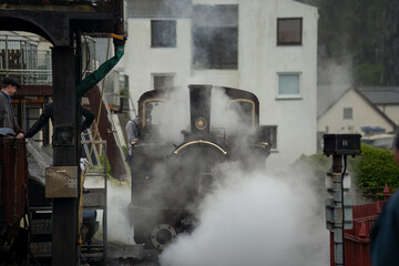 a vintage working steam locomotive train, Ffestiniog narrow gauge railway in Snowdonia National Park, Wales UK