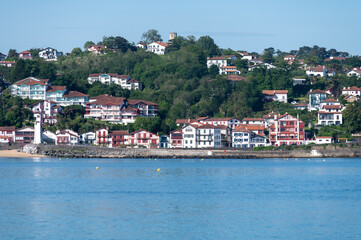 Obraz premium White houses and villas of Cibourne on Basque coast, famous resort, known for beautiful architecture, nature and cuisine, South of France, Basque Country