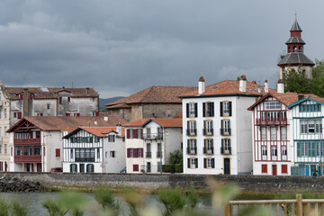 Obraz premium Houses and port of old part of Cibour on Basque coast, famous resort, known for beautiful architecture, sandy beaches, cuisine, South of France, Basque Country