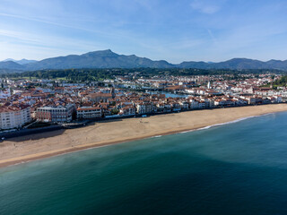 Fototapeta premium Aerial view on Ciboure and Saint Jean de Luz bay, port, sandy beach on Basque coast, beautiful architecture, nature and cuisine, South of France, Basque Country