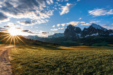 Fototapeta premium Panoramic view of the Langkofel Group from Seiser Alm in the Dolomites in South Tyrol, Italy.