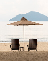 beach chairs and umbrella on Lio beach, Philippines