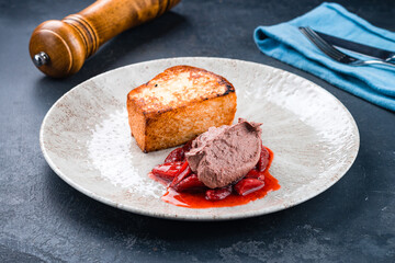 Liver pate with strawberry sauce and fried white bread.