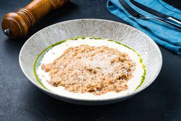 Italian lunch risotto with parmesan, mushrooms and cream sauce.