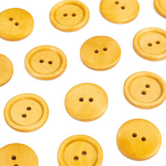 Wooden buttons on a white background