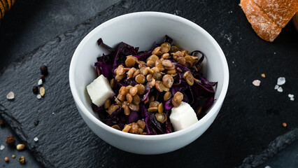 Lunch salad of red cabbage, lentils and feta cheese.
