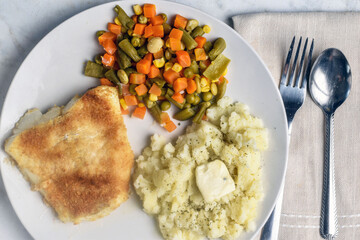 baked cod  with mixed vegetables and mash potatoes