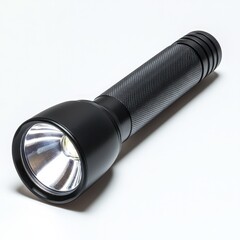 A black flashlight with a white light