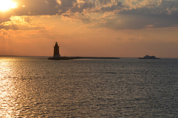 Delaware Breakwater Lighthouse at Cape Henlopen State Park at sunset