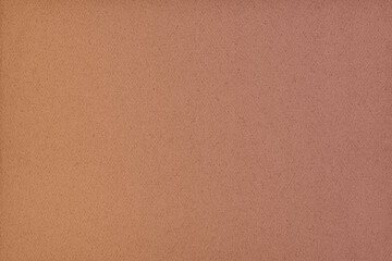 Warm textured background with subtle gradient in shades of orange and peach during sunset hours