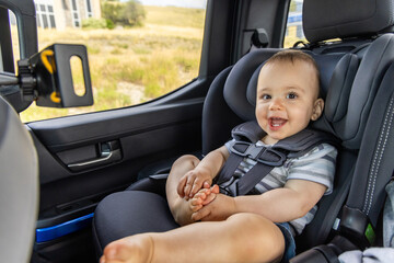 Happy Baby in Car Seat During Scenic Drive