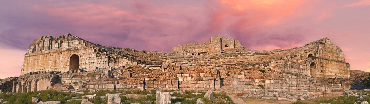Miletus, city or theater for history, travel or ancient archeology outdoor in Turkiye. Tourism, building or architecture with amphitheater ruins for culture, heritage site or holiday banner at sunset